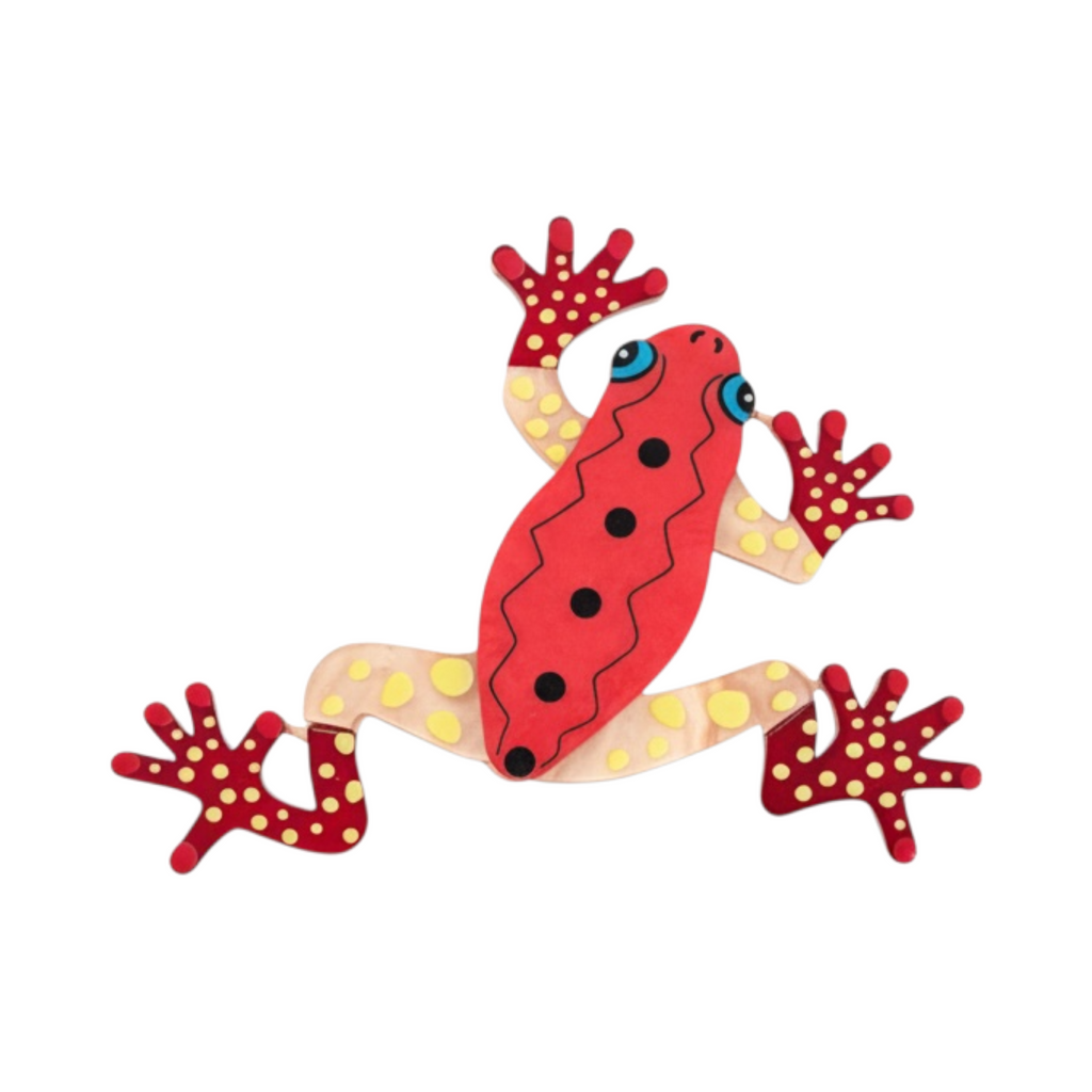 Broche MIMOSA de La Mariposa, color rojo, con forma de rana y lunares decorativos. Vista frontal.